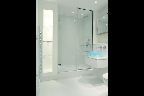 High-quality interiors such as this hotel bathroom pod are much easier to deliver in factory conditions